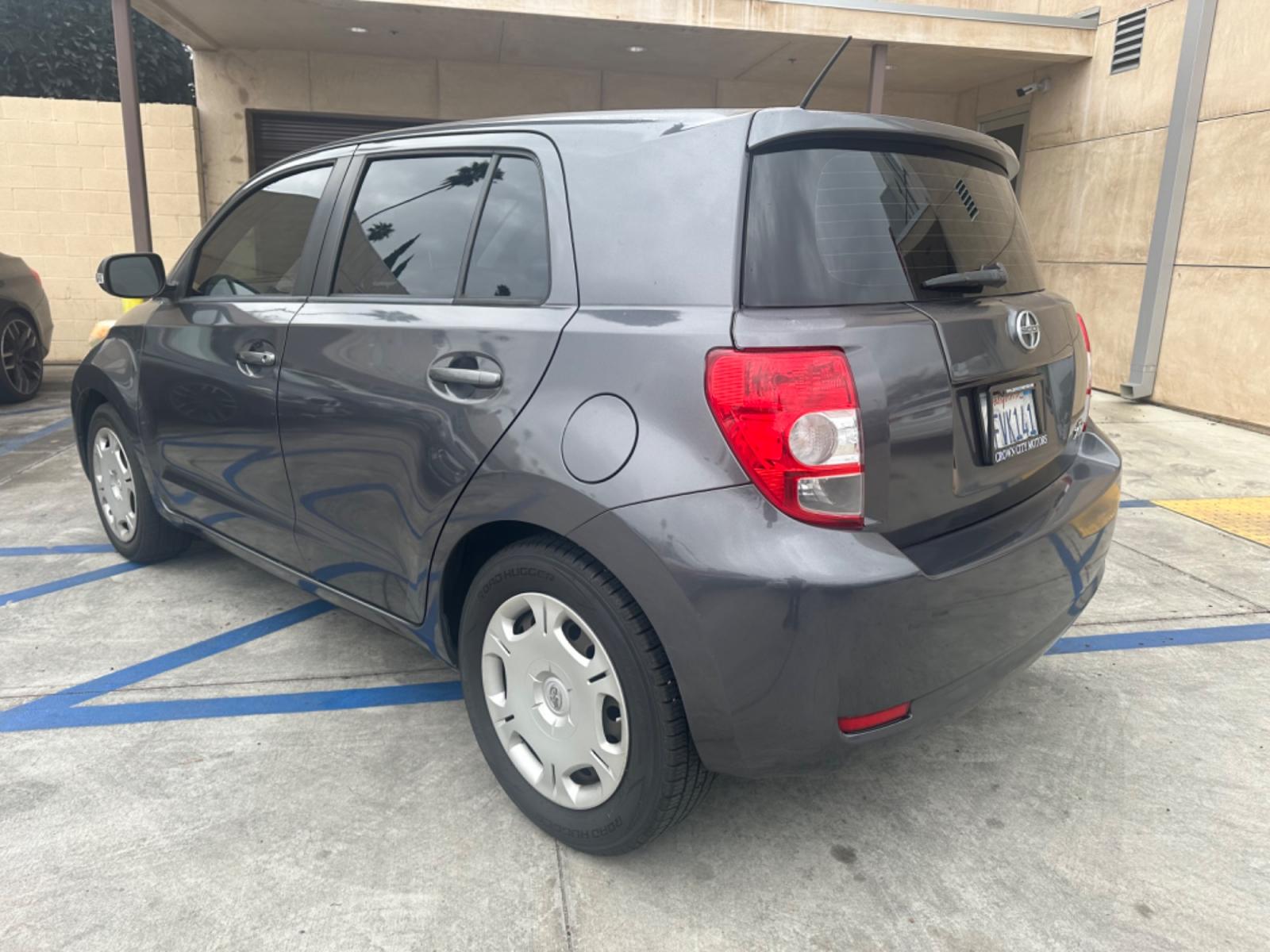 2009 Gray /Black Scion xD 5-Door (JTKKU104X9J) with an 1.8L L4 DOHC16V engine, automatic transmission, located at 30 S. Berkeley Avenue, Pasadena, CA, 91107, (626) 248-7567, 34.145447, -118.109398 - The 2009 Scion XD 4-Door Hatchback is a compact, versatile, and stylish vehicle that offers an exceptional driving experience. Located in the heart of Pasadena, CA, our dealership specializes in a comprehensive selection of used BHPH (Buy Here Pay Here) cars, including the dynamic Scion XD. This veh - Photo #6